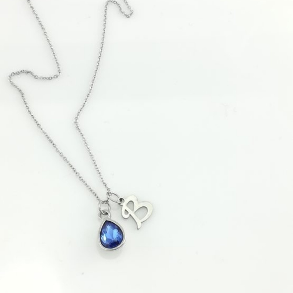 Blue crystal initial charm necklace